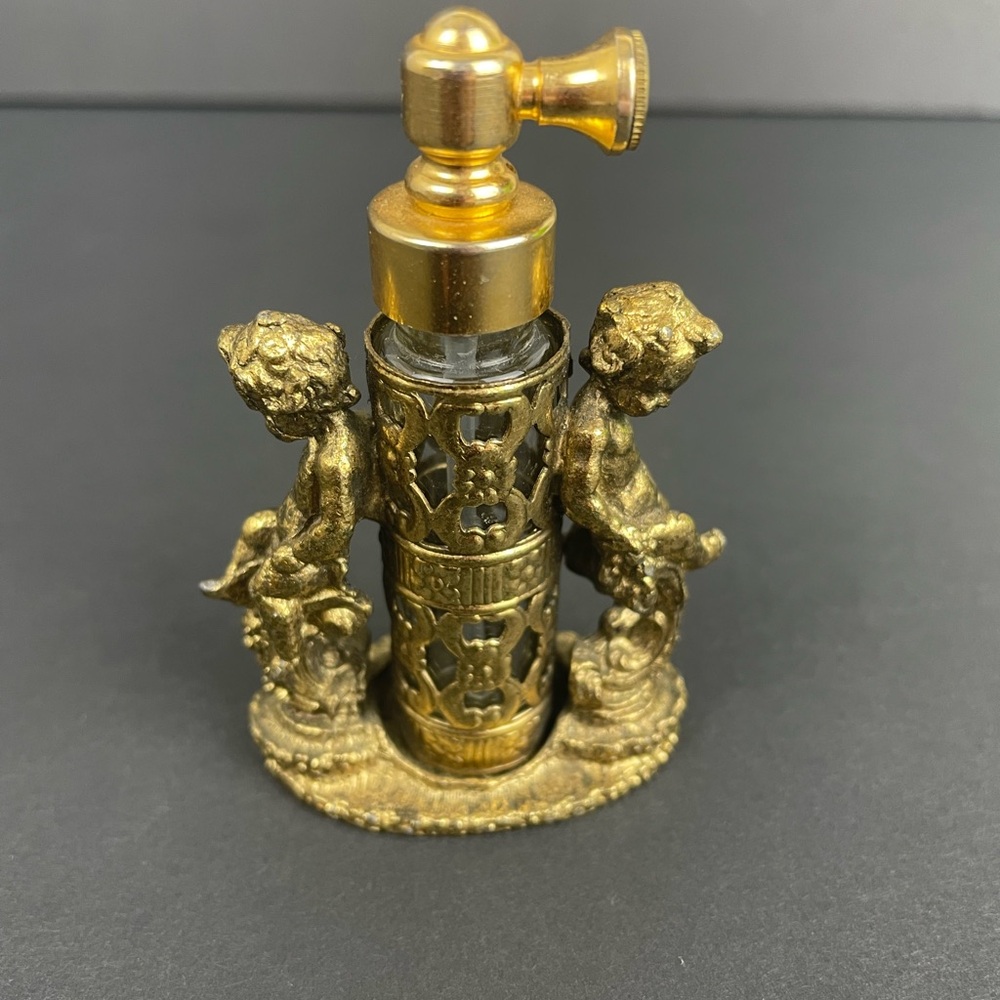 Vintage Gold Perfume Bottle with Cherub Design